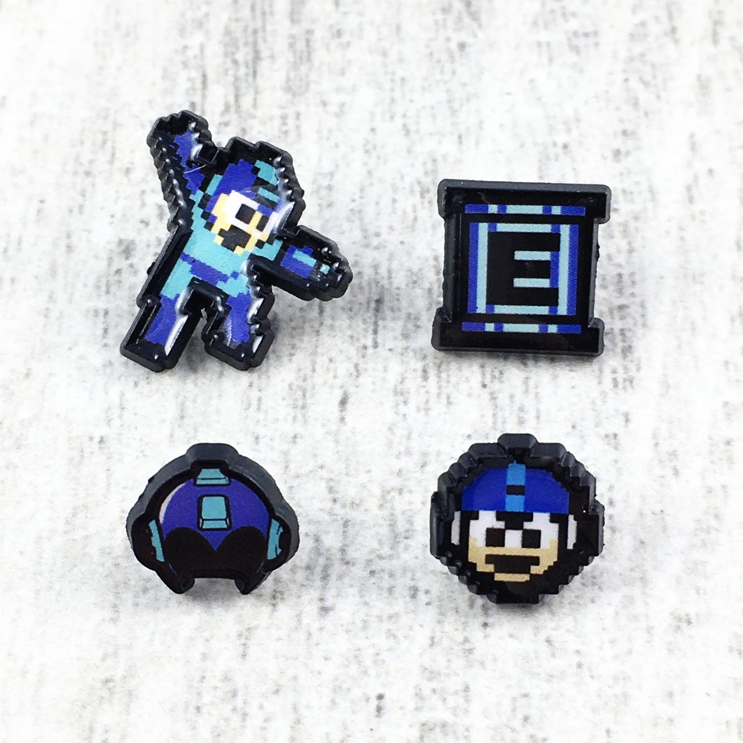 chez-rhox-geek-stop-pin-enamel-capcom-mega-man-set-of-4.jpg