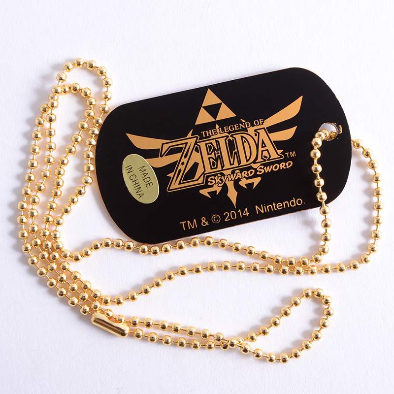 chez-rhox-geek-stop-necklace-nintendo-the-legend-of-zelda-dog-tag-hyrule-emblem-2.jpg