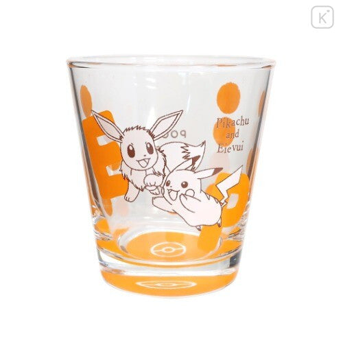 chez-rhox-geek-stop-glass-pokemon-pocket-monsters-pikachu-and eevee-eievui-orange-dots-tumbler.jpeg