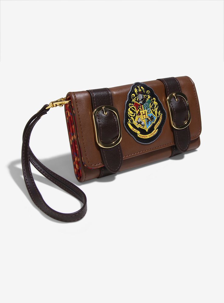 chez-rhox-geek-stop-wallet-harry-potter-suitcase-hogwarts-logo.jpg