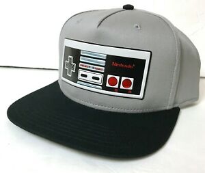 chez-rhox-geek-stop-cap-nintendo-nes-controller-gray-black-snapback.jpg